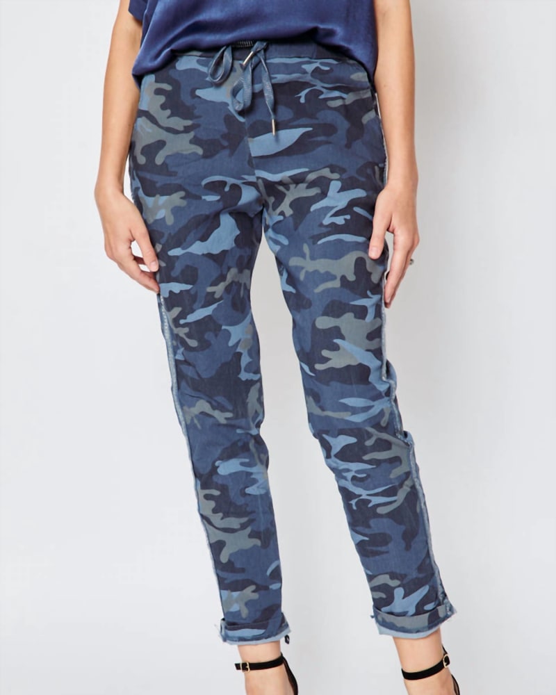 Front of a model wearing a size O/S D Style Silver Stripe Camo Pants In Blue Jeans in Blue Jeans by Jacqueline B Clothing. | dia_product_style_image_id:352003